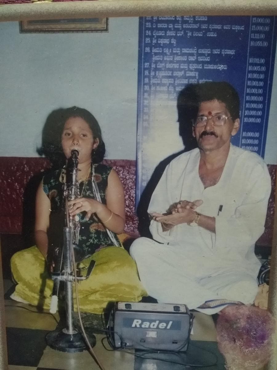 Sundar Sherigar with young Pooja Devadiga.