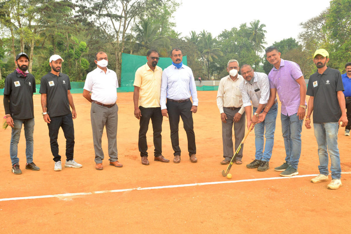 ZP member Padiyammanda Murali Karumbaiah inaugurates the Nalkunadu Hockey Tournament in Napoklu on Friday.