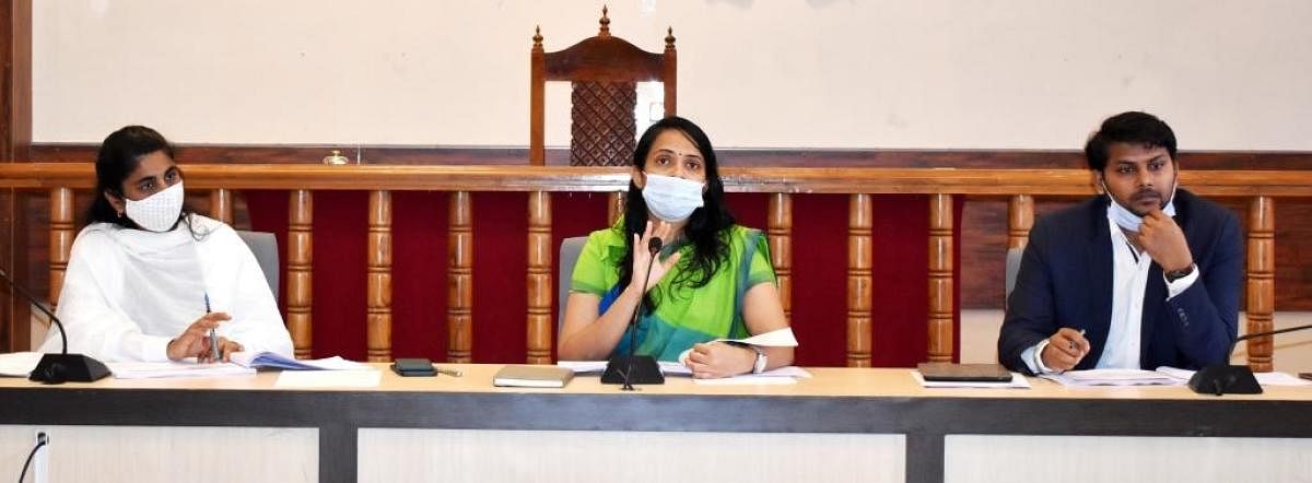 Deputy Commissioner Annies Kanmani Joy speaks at a meeting in Madikeri.