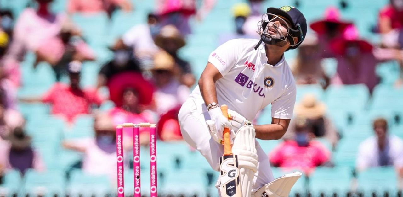 India's Rishabh Pant watches the ball after being hit by a short delivery from Australia's Mitchell Starc during day three of the third cricket Test match between Australia and India at the Sydney Cricket Ground (SCG) on January 9, 2021. Credit: AFP Photo