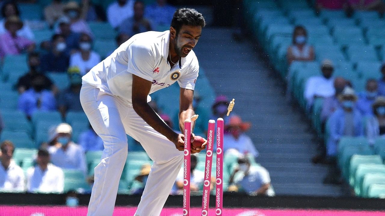 India's Ravichandran Ashwin tries to run out Australia's Cameron Green during day four of the third cricket Test match between Australia and India at the Sydney Cricket Ground (SCG) on January 10, 2021. Credit: AFP Photo