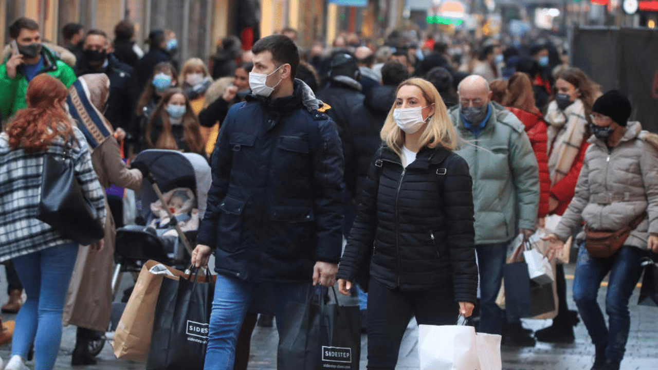 People fill Cologne's main shopping street Hohe Strasse (High Street) during the spread of the coronavirus pandemic in Cologne, Germany. Credit: Reuters File Photo