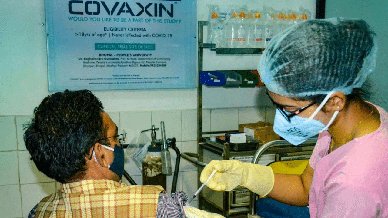  A medic administers Covaxin, developed by Bharat Biotech in collaboration with the Indian Council of Medical Research (ICMR), during the Phase- 3 trials at the People's Medical College in Bhopal, Monday, Dec. 7, 2020. Credit: PTI Photo