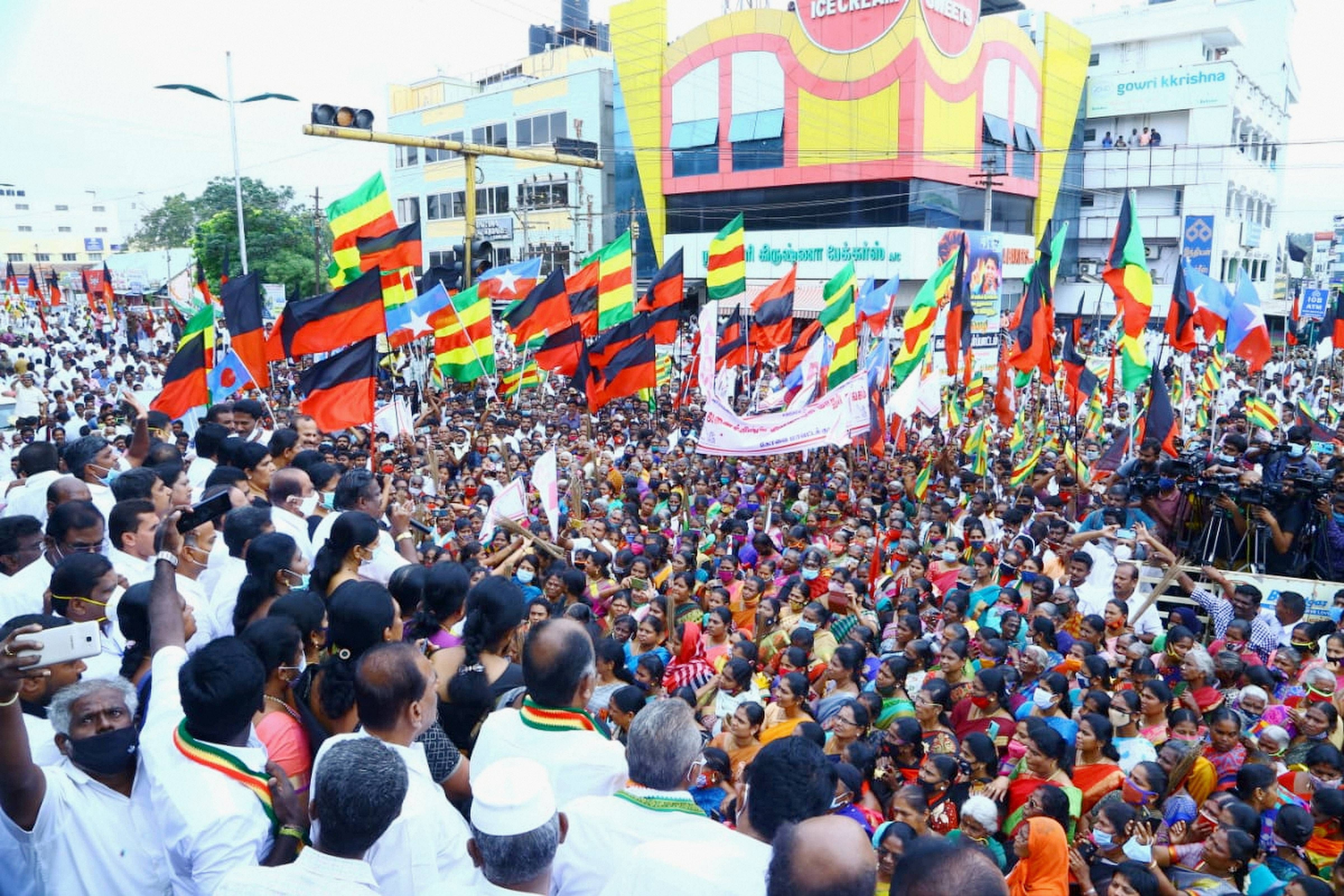 Dravida Munnetra Kazhagam (DMK) Women's Wing Secretary Kanimozhi along with members of other opposition political party takes part in a protest over Pollachi sexual assault case, in Coimbatore district, Sunday, Jan. 10, 2021. Credit: PTI Photo