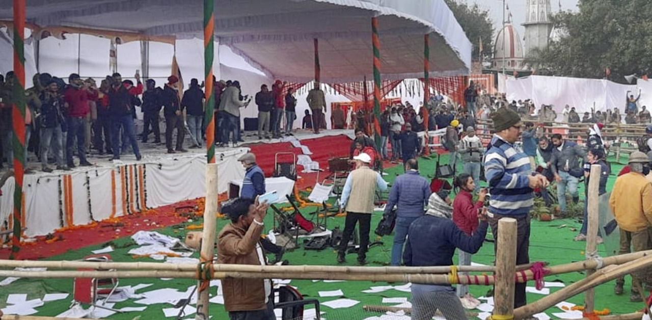  Farmers ransack the venue of Chief Minister Manohar Lal Khattar's 'Kisan Mahapanchayat' during their protest, at Kaimla village in Karnal district, Sunday, Jan. 10, 2021. Credit: PTI Photo