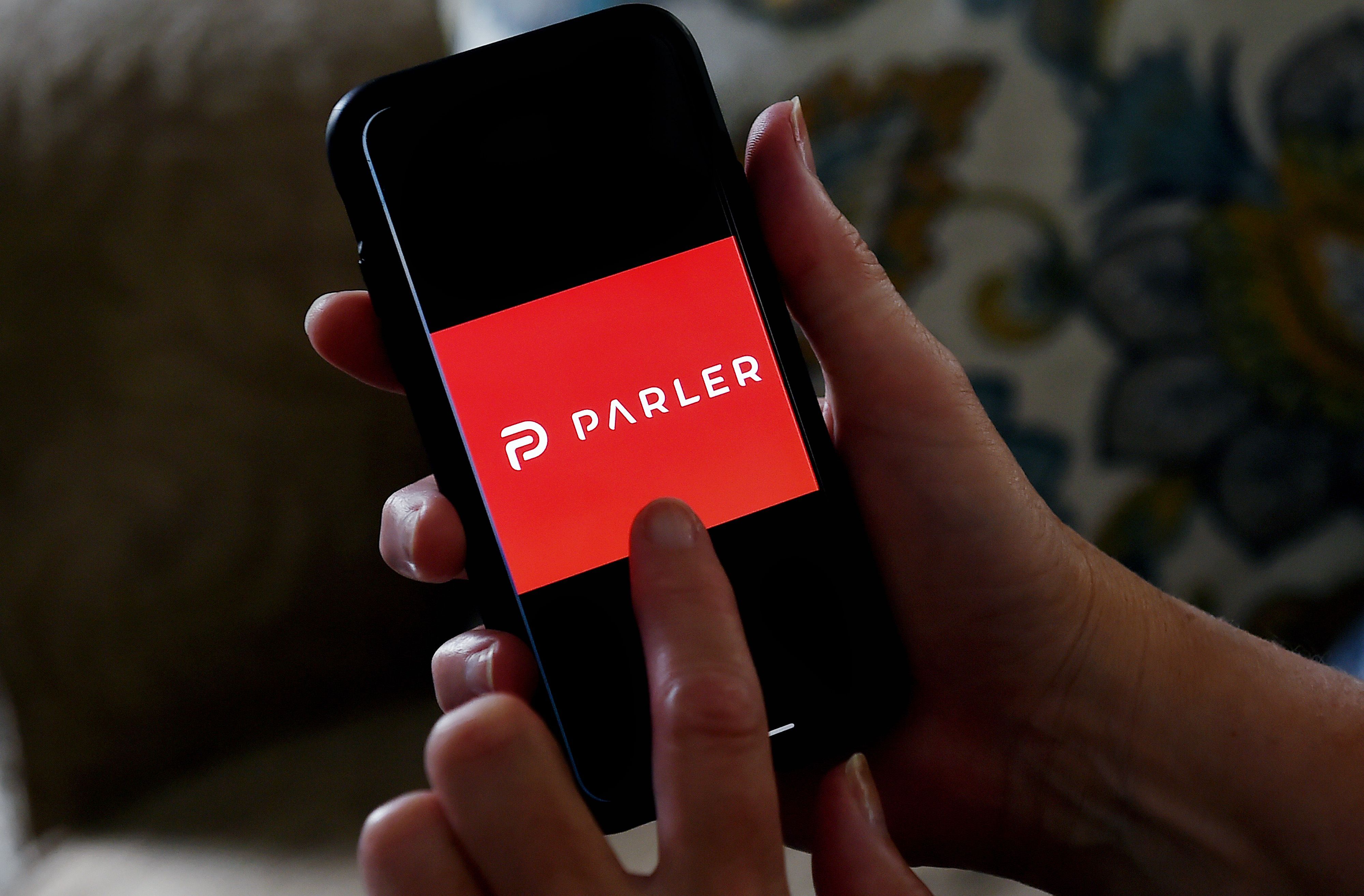By Saturday, Apple and Google had removed Parler from their app stores, limiting its ability to reach new users on virtually all of the world’s smartphones. Credit: AFP