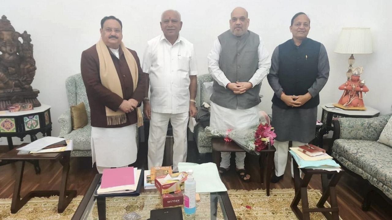 Union Home Minister Amit Shah along with BJP National President JP Nadda, Karnatak Chief Minister BS Yediyurappa, and BJP Karnataka in-charge Arun Singh during a meeting, in New Delhi. Credit: PTI/BJP handout.
