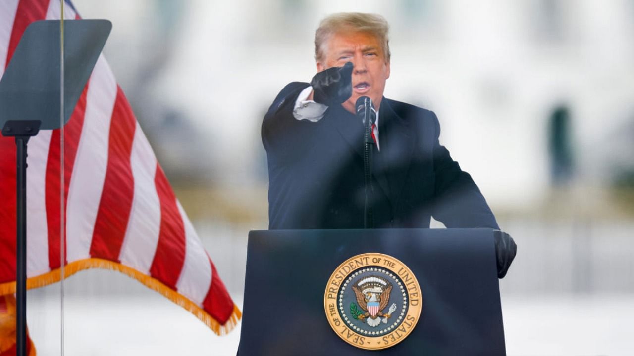US President Donald Trump gestures as he speaks during a rally to contest the certification of the 2020 US presidential election results by the US Congress, in Washington. Credit: Reuters.