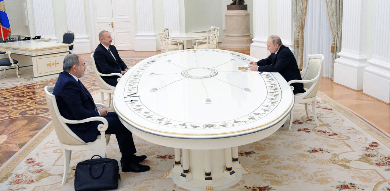 Russian President Vladimir Putin (R) holds a meeting with Armenian Prime Minister Nikol Pashinyan (L) and Azerbaijani President Ilham Aliyev over the disputed Nagorno-Karabakh region's future at the Kremlin in Moscow. Credit: AFP Photo