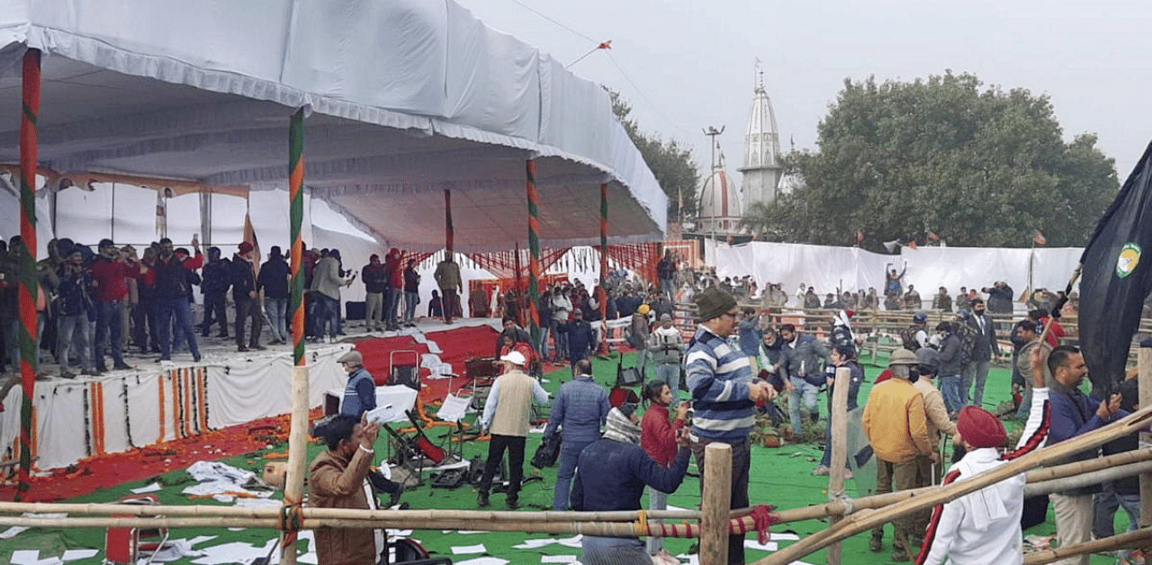 Farmers ransack the venue of Chief Minister Manohar Lal Khattar's 'Kisan Mahapanchayat' during their protest, at Kaimla village in Karnal district, Sunday. Credit: PTI Photo