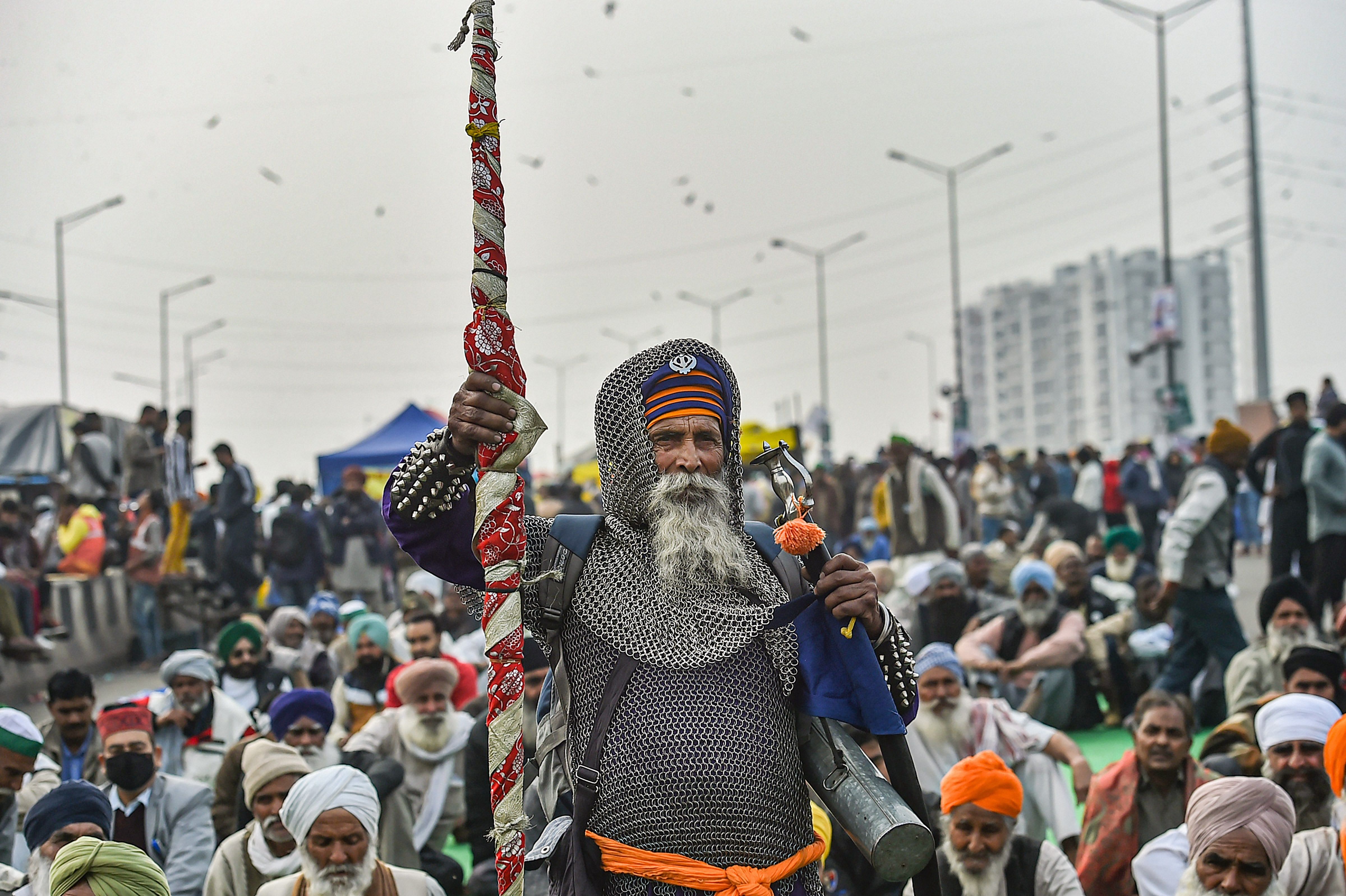 Farmers at a meeting during their ongoing agitation against new farm laws, at Ghazipur border. Credit: PTI/ Representative