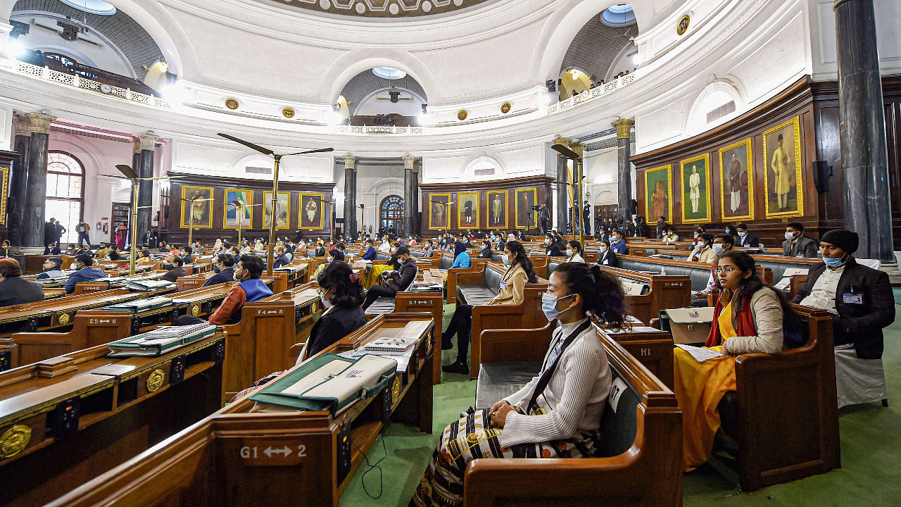 Finalists of the National Youth Parliament Festival-2021 listen to Lok Sabha Speaker Om Birla (unseen) at Central Hall of Parliament House, in New Delhi. Credit: PTI Photo