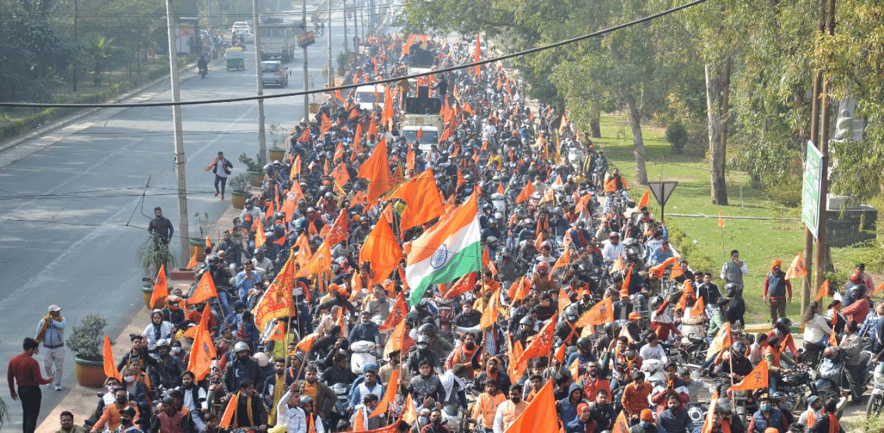 Devotees during a bike rally to collect funds for the construction of Ram Temple in Ayodhya, in Ghaziabad. Credit: PTI Photo