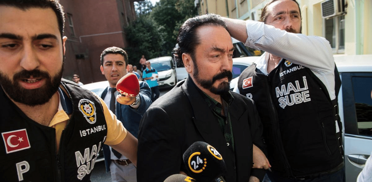 A Turkish court on January 11, 2021 sentenced a Muslim televangelist who surrounded himself with scantily clad women he called "kittens" to more than 1,000 years in jail for sex crimes. Credit: AFP Photo