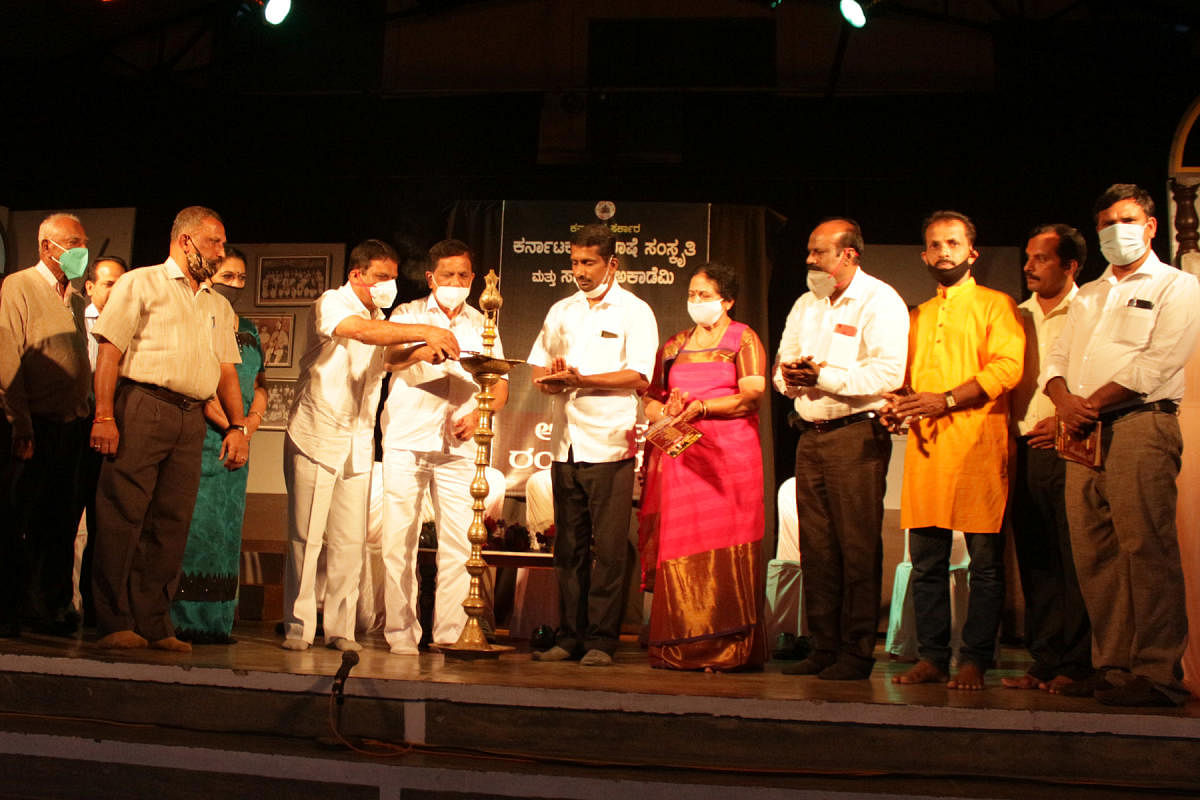 MLAs M P Appachu Ranjan and K G Bopaiah inaugurate an Arebhashe play show in Madikeri.