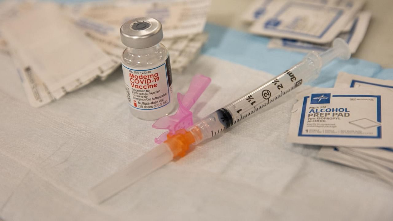A vial of the Moderna Covid-19 vaccine at Queens Police Academy in the Queens borough of New York. Credit: Reuters.