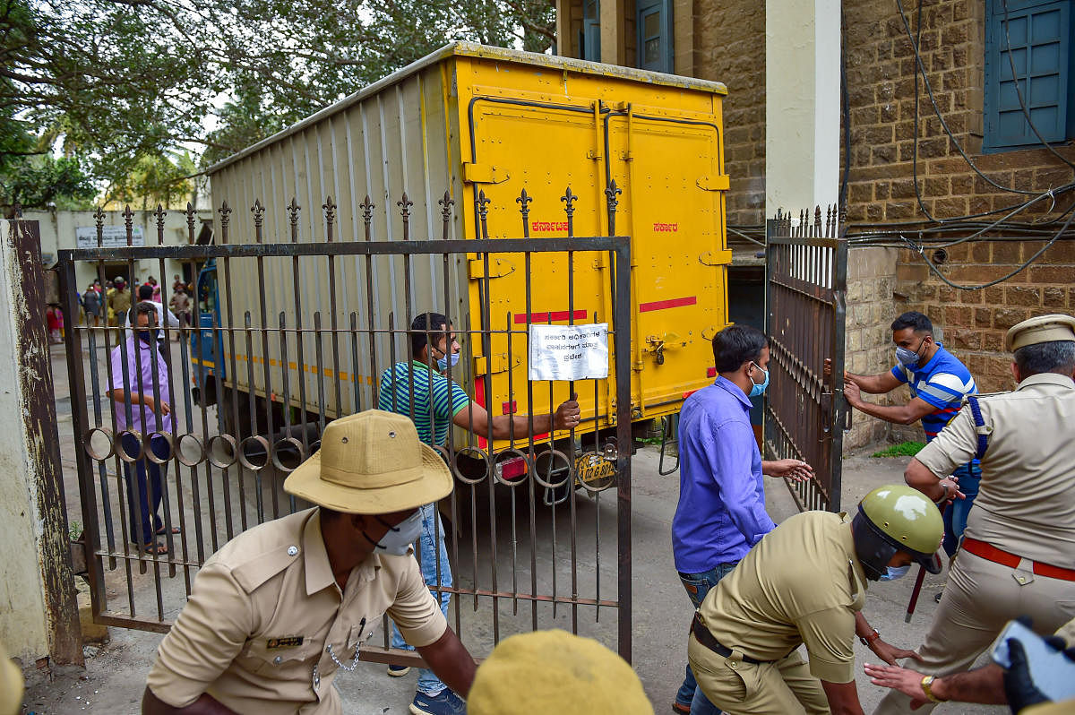 First consignment of Covishield vaccine, dispatched from Pune's Serum Institute of India, being transported in a temperature-controlled truck to a storage facility, in Bengaluru, Tuesday, Jan. 12, 2021. Credit: PTI Photo