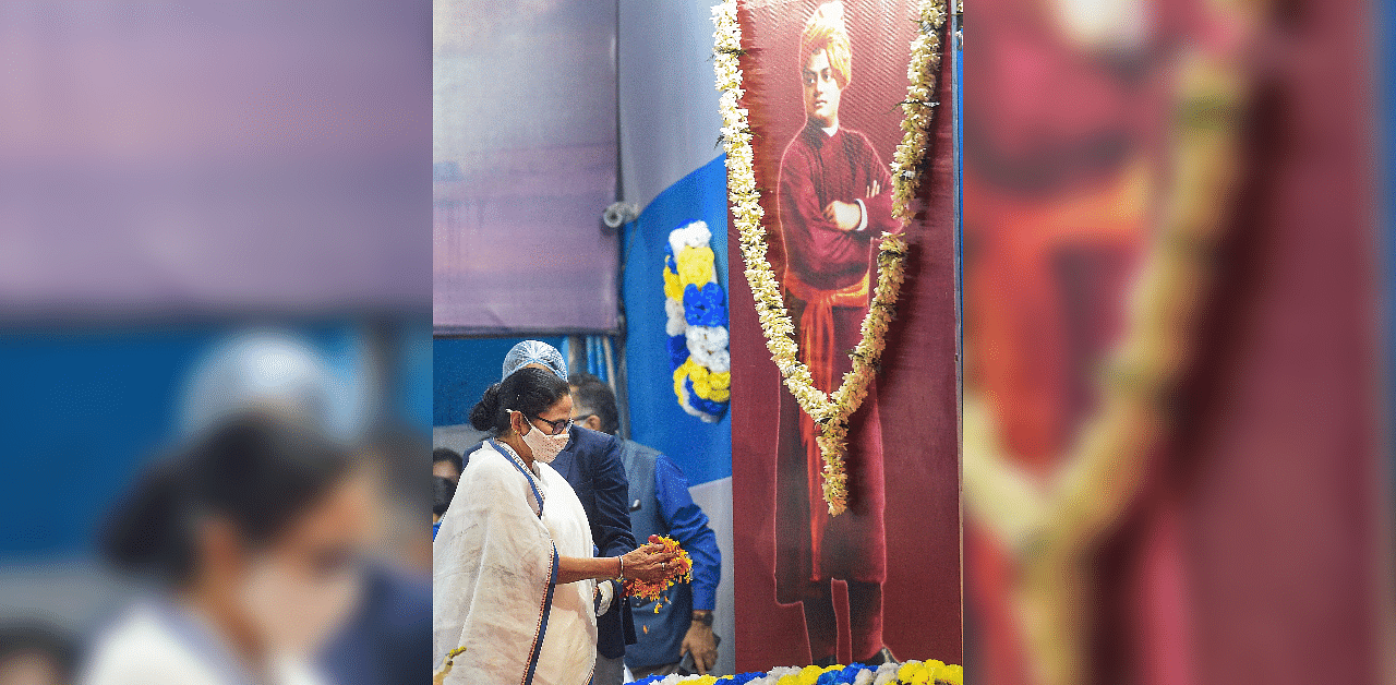 West Bengal Chief Minister Mamata Banerjee pays tribute to Swami Vivekananda during a programme at Babughat transit camp. Credit: PTI Photo