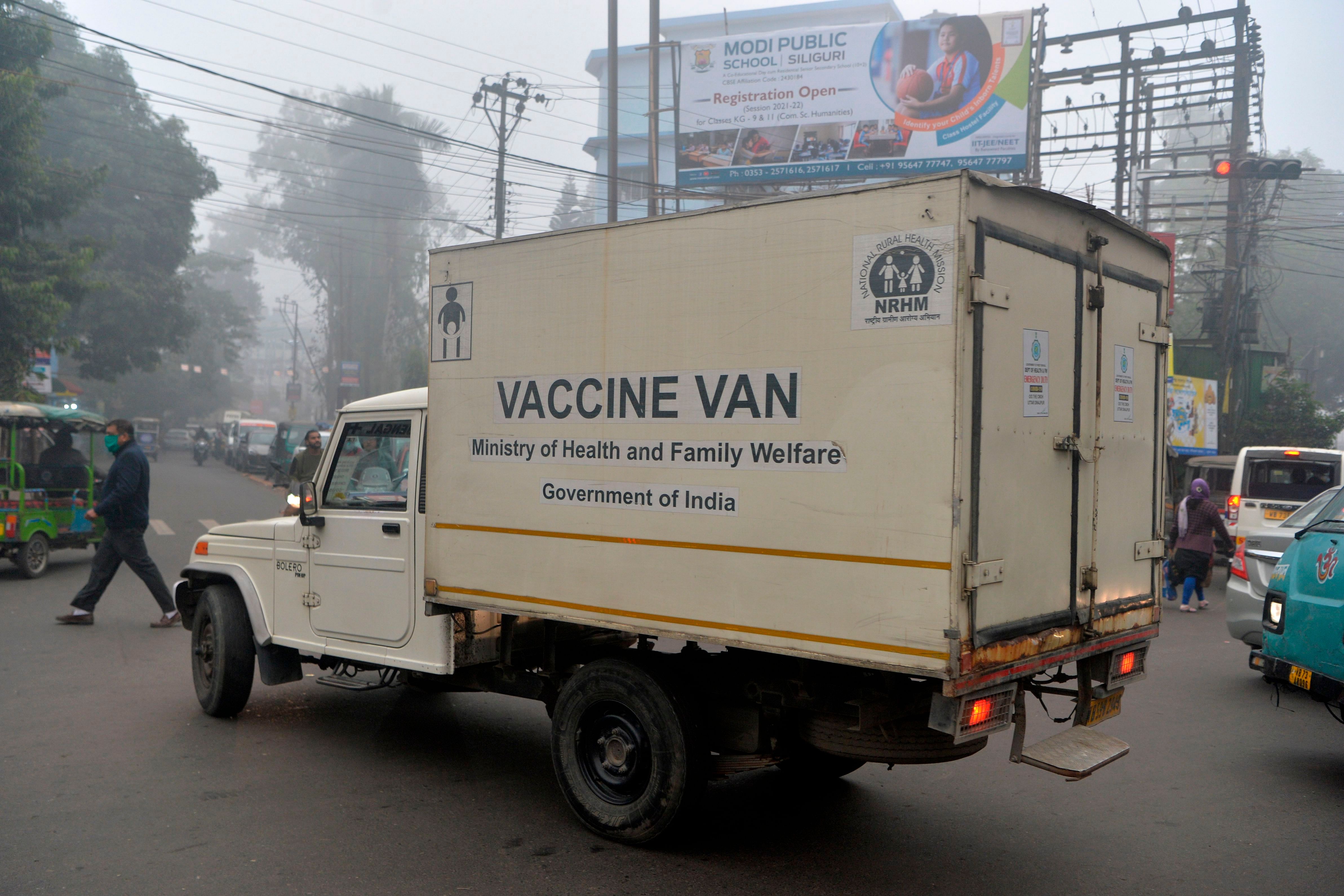 A van transports boxes of Covishield vaccine to different areas of the city in Siliguri on January 12, 2021. Credit: AFP File Photo