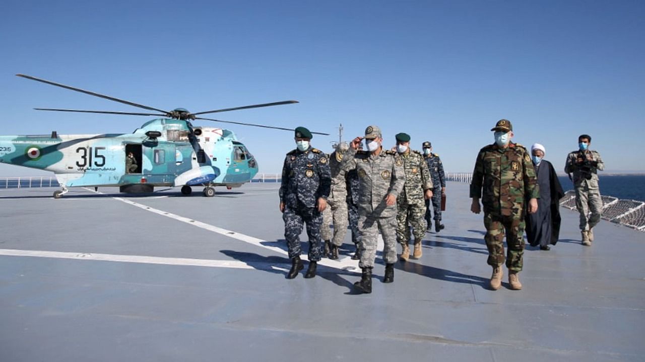 A handout photo made available by the Iranian Army office on January 13, 2021, shows Iran-made warship Makran prior to be joined to the Navy, in drill in the Gulf of Oman. Credit: Iranian Army office/AFP Photo