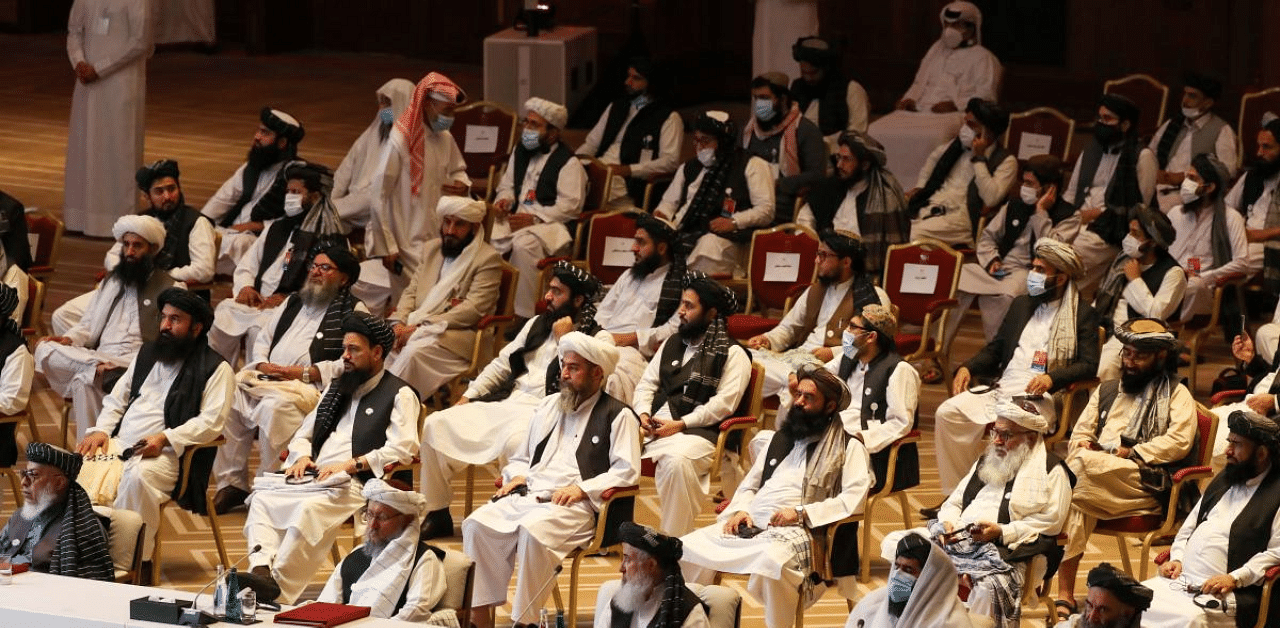 Taliban delegation attend the opening session of the peace talks between the Afghan government and the Taliban. Credit: AFP Photo