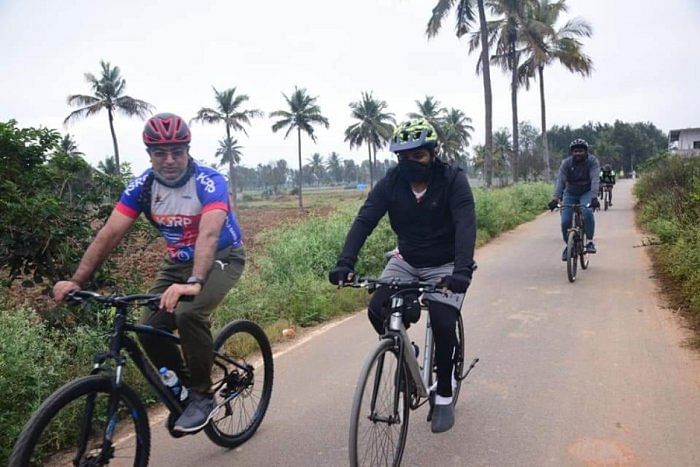 Cyclists pedal on the scenic countryside on the outskirts of Bengaluru during the 40-km Signature Ride on Sunday. Credit: Special Arrangement