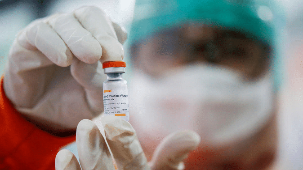 A medical worker holds a dose of the Sinovac's vaccine at a district health facility as Indonesia begins mass vaccination for the coronavirus disease (Covid-19), in Jakarta. Credit: Reuters Photo