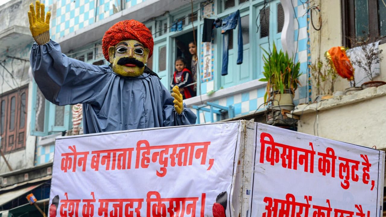 Farmers stage a protest against the new farm laws, in Beawar. Credit: PTI Photo