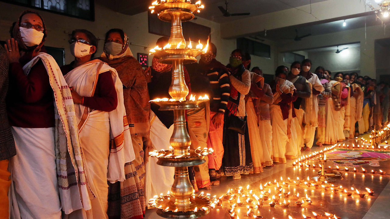 Malayali community people offer prayers at an Ayyappa temple on the occasion of Makaravilakku festival, in Bhopal. Credit: PTI Photo