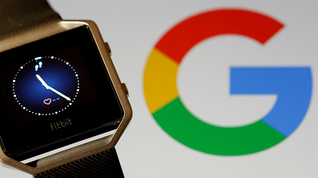 Fitbit Blaze watch is seen in front of a displayed Google logo. Credit: Reuters Photo