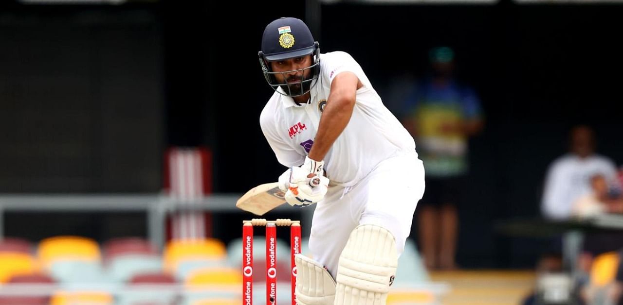 India's batsman Rohit Sharma plays a shot on day two of the fourth cricket Test match between Australia and India at The Gabba in Brisbane on January 16, 2021. Credit: AFP Photo