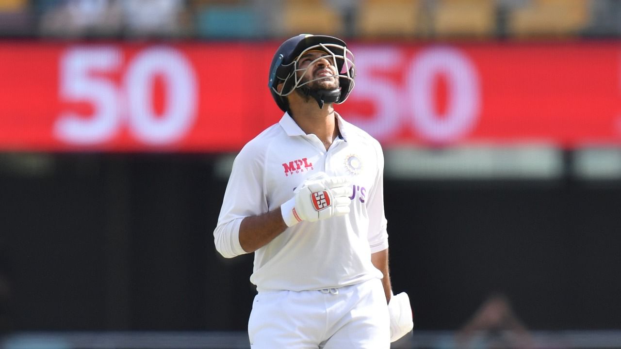 Shardul Thakur of India celebrates his half century during day three of the fourth test match between Australia and India at the Gabba in Brisbane, Australia. Credit: Reuters Photo