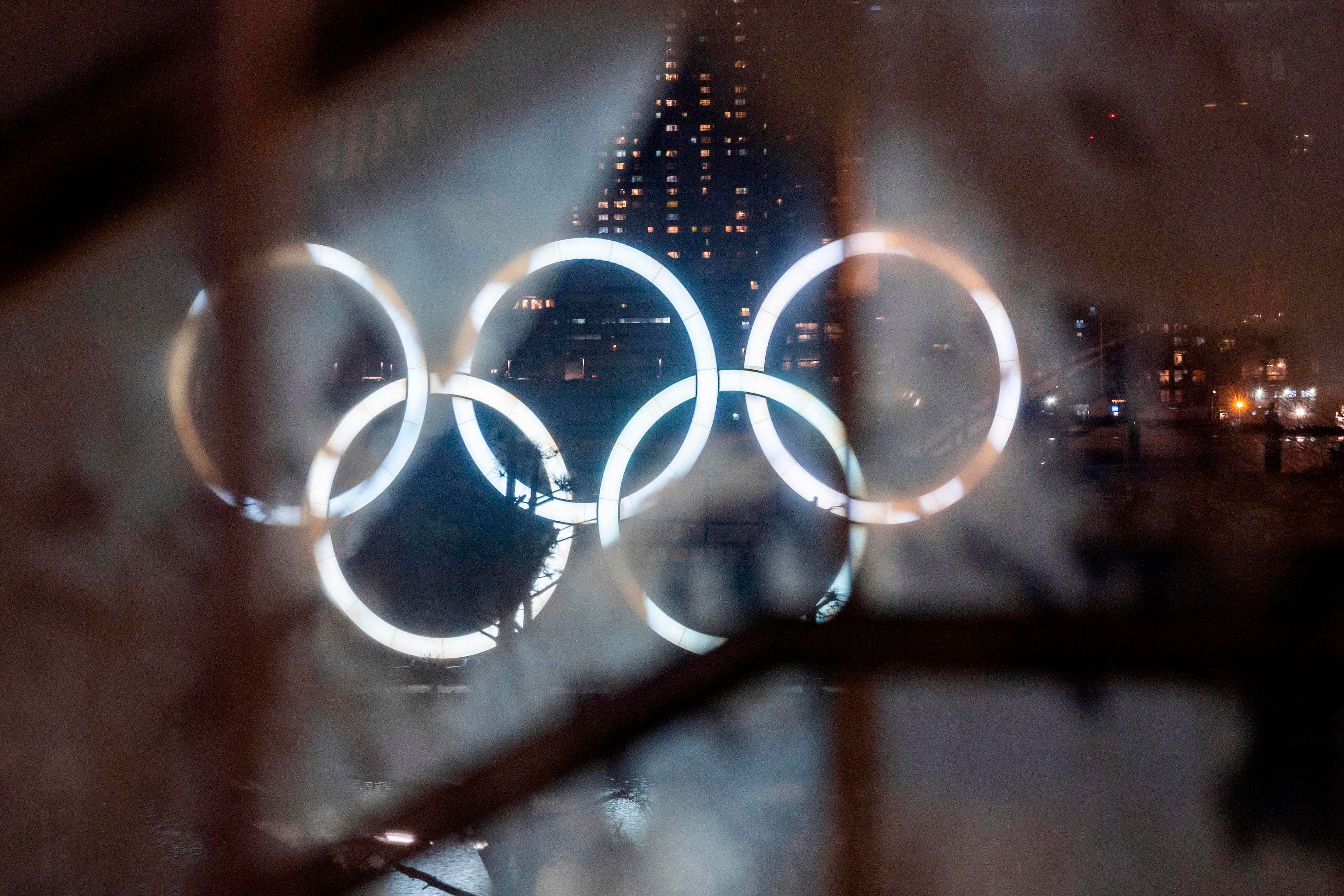 The Olympic rings are lit up at the Odaiba waterfront in Tokyo. Credit: AFP Photo