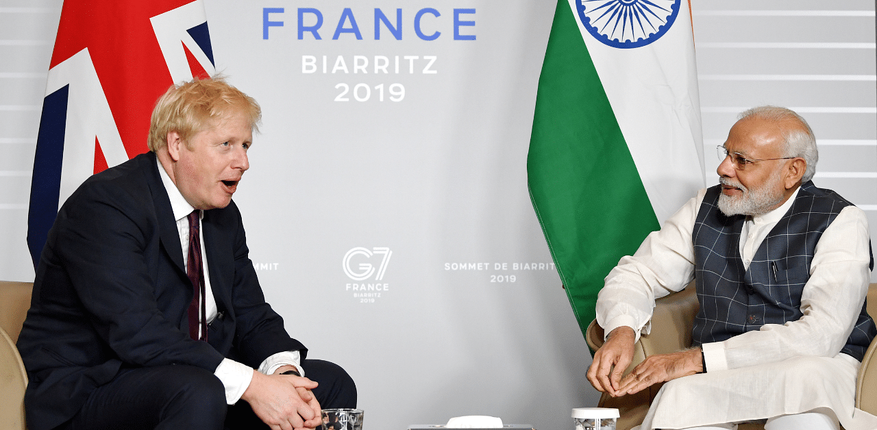 Britain's Prime Minister Boris Johnson meets Indian Prime Minister Narendra Modi at a bilateral meeting during the G7 summit in 2019. Credit: Reuters Photo