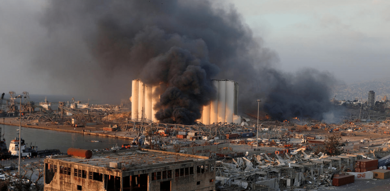 Smoke rises from the site of an explosion in Beirut's port area. Credit: Reuters Photo