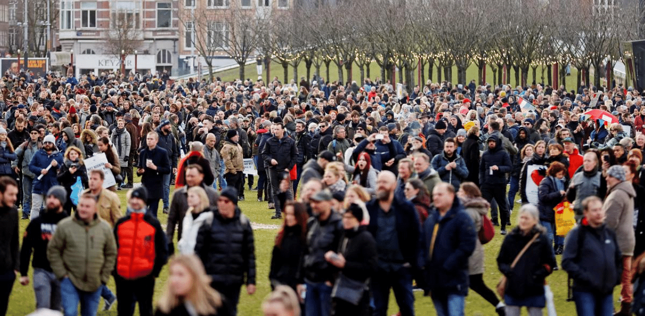 Protesters are seen during a demonstration in the Museumplein town square in Amsterdam, Netherlands. Credit: AFP Photo