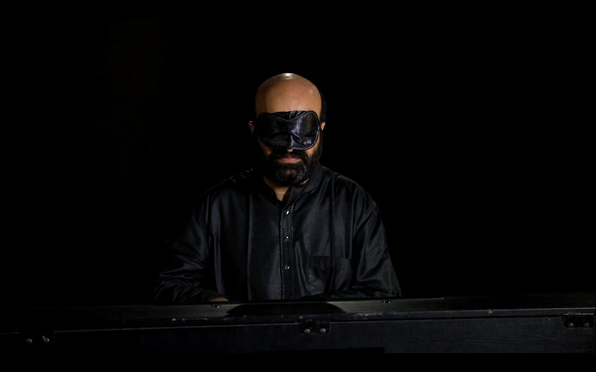 Pianist Anil Srinivasan playing blindfolded.