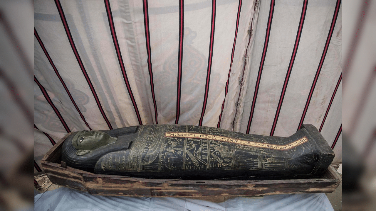 A sarcophagus is displayed during the official announcement of the discovery by an Egyptian archaeological mission of a new trove of treasures at Egypt's Saqqara necropolis south of Cairo, on January 17, 2021. Credit: AFP Photo