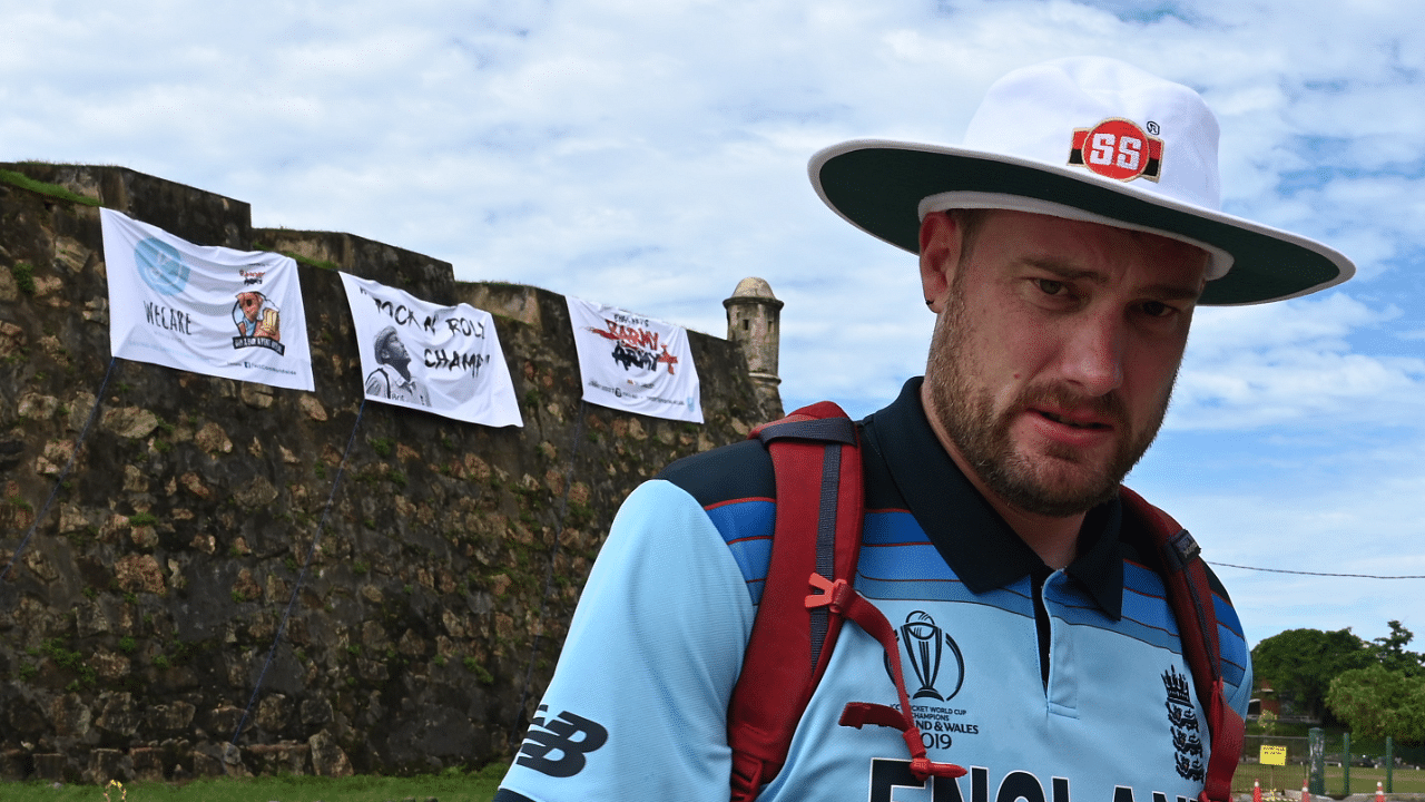 England's cricket fan Rob Lewis poses for photos at the ramparts of the Galle Fort overlooking the Galle International Cricket Stadium on the first day of the first Test cricket match between England and Sri Lanka in Galle on January 14, 2021. Credit: AFP File Photo