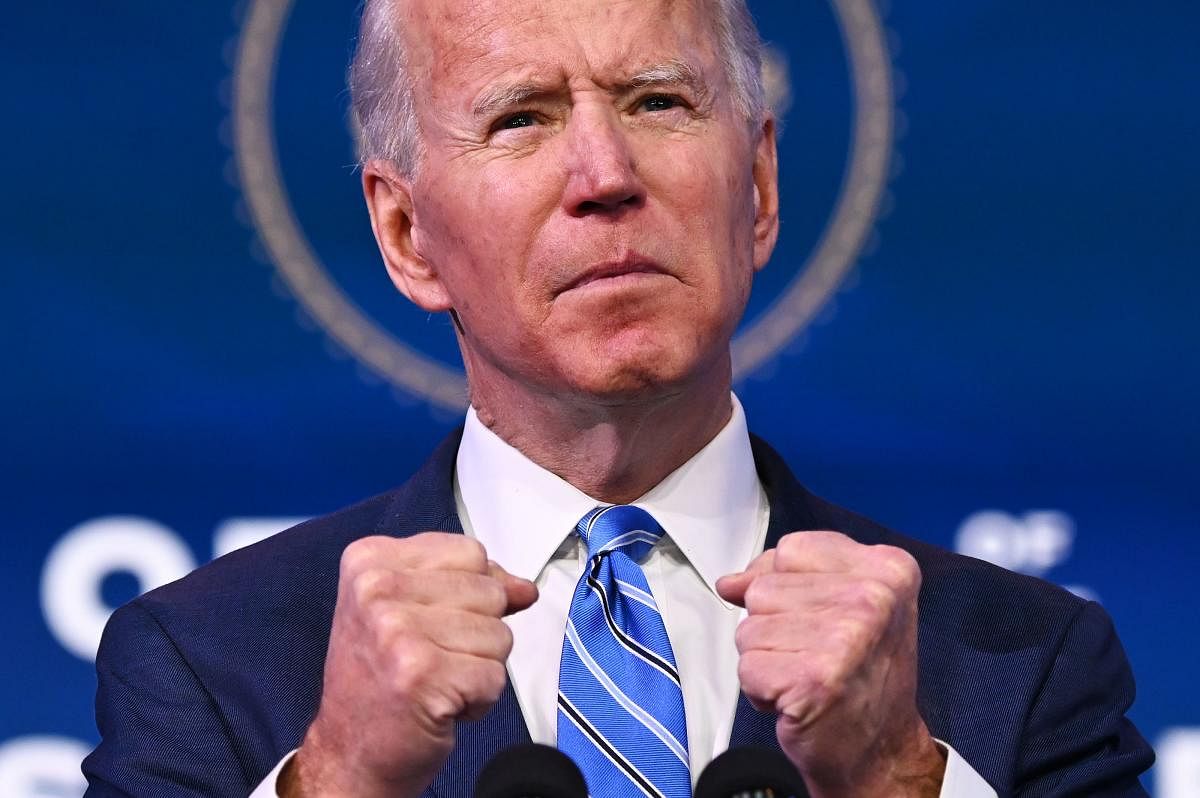 In this file photo taken on January 14, 2021 US President-elect Joe Biden delivers remarks on the public health and economic crises at The Queen theater in Wilmington, Delaware. Credit: AFP Photo