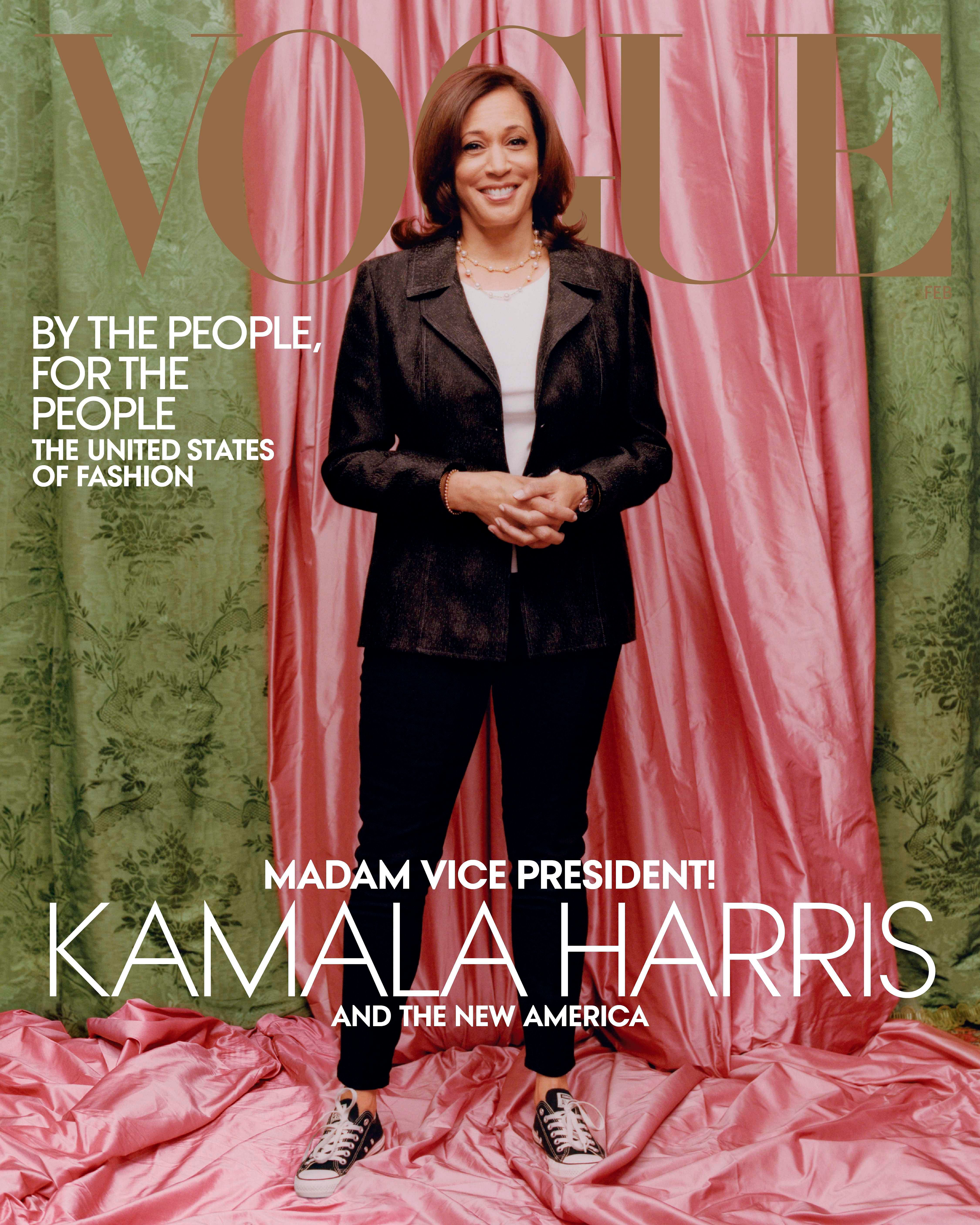 This handout photo obtained on January 12, 2021 courtesy of Vogue shows against colors inspired by those of her Howard university sorority, Alpha Kappa Alpha, Vice President–elect Kamala Harris as she wears a Donald Deal jacket and Converse sneakers on the February 2021 cover of Vogue magazine. Credit: AFP via Vogue