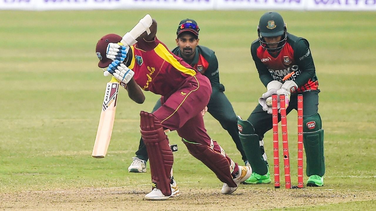 West Indies' Alzarri Joseph (L) is clean bowled off Bangladesh's Shakib Al Hasan during the first one-day international (ODI) cricket match between Bangladesh and West Indies. Credit: AFP Photo