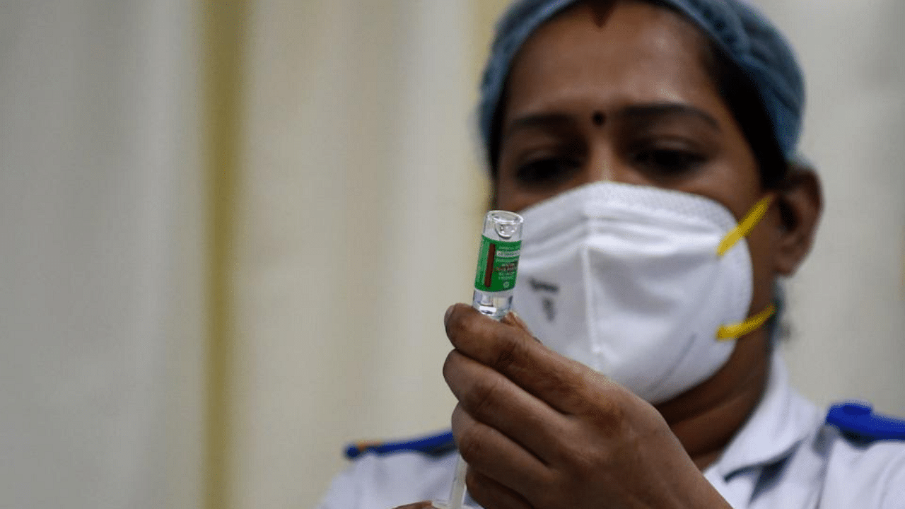 A health worker prepares to administer a dose of a Covid-19 coronavirus vaccine at the Rajawadi Hospital in Mumbai on January 19, 2021. Credit: AFP Photo