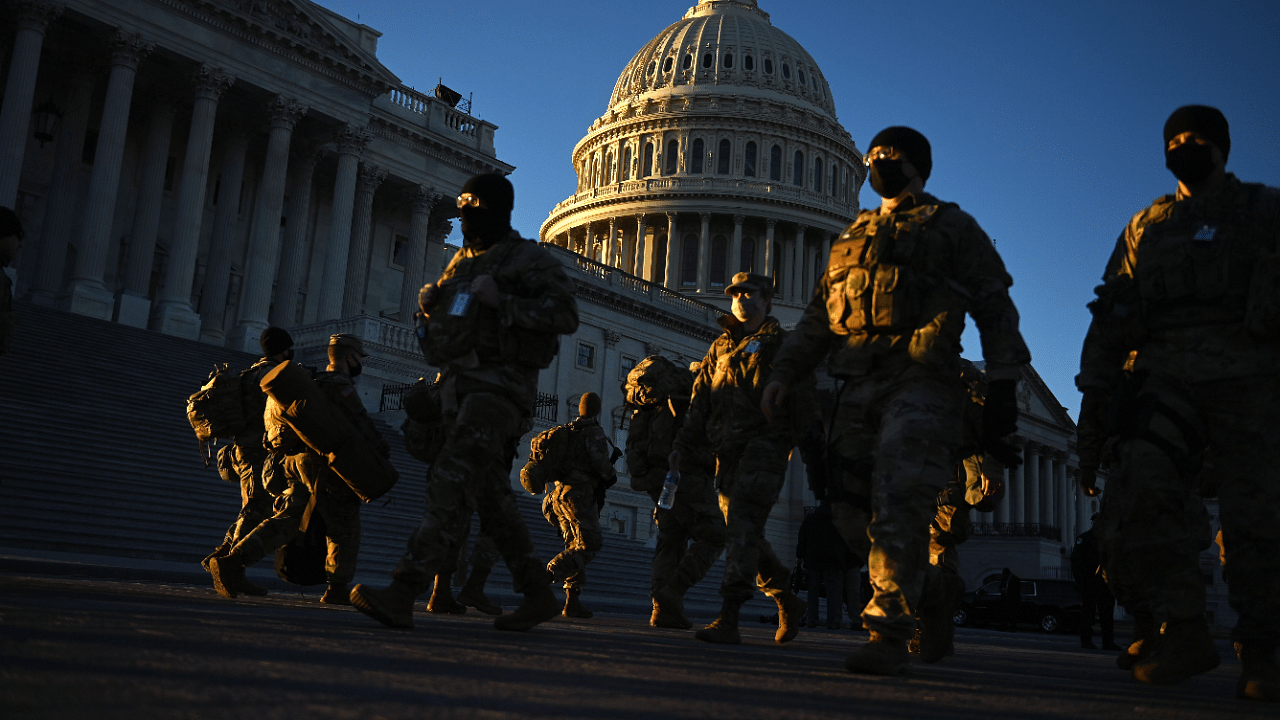Members of the US National Guard are seen outside the US Capitol in Washington, DC, ahead of the 59th inaugural ceremony for President-elect Joe Biden and Vice President-elect Kamala Harris. Credit AFP Photo