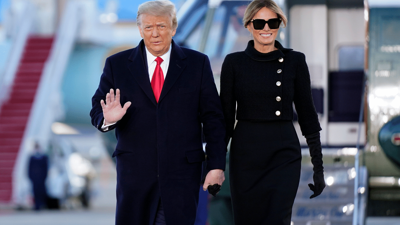 President Donald Trump and first lady Melania Trump arrive on Marine One before boarding Air Force One at Andrews Air Force Base. Credit: AP Photo