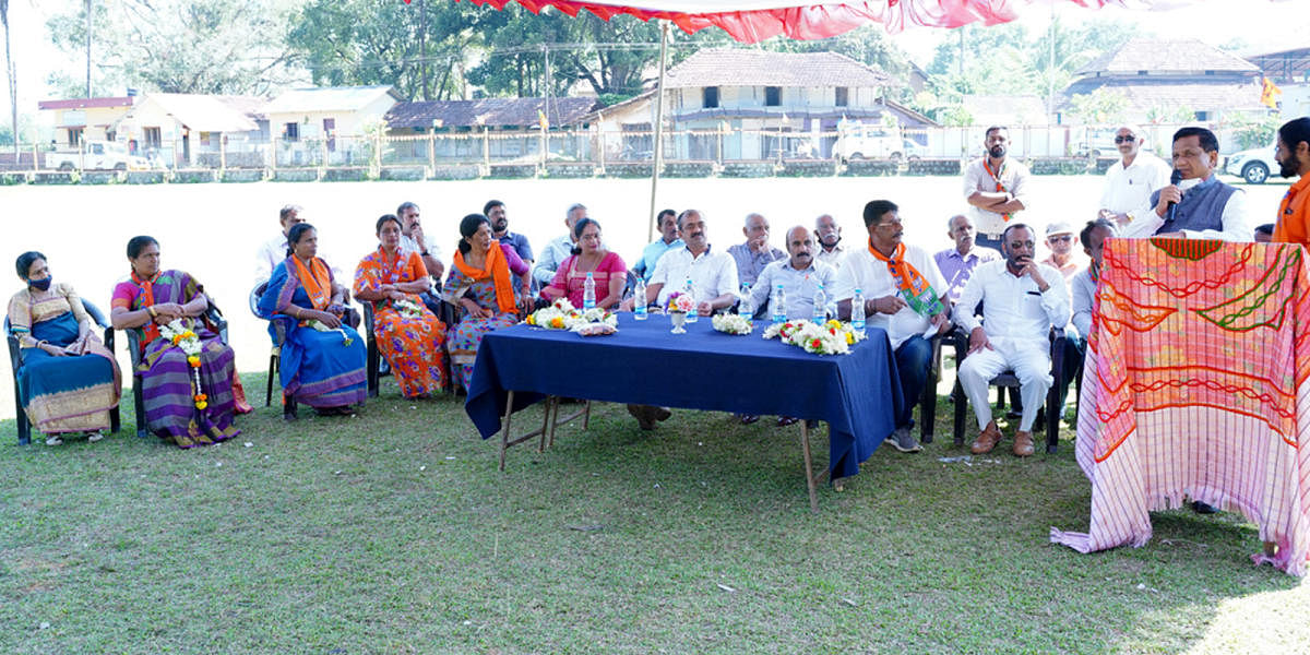 MLA K G Bopaiah speaks at a felicitation programme for BJP-backed Gram Panchayat members at Napoklu.