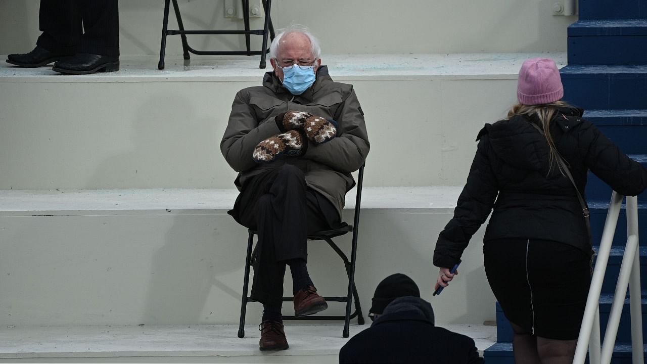 Former presidential candidate, Senator Bernie Sanders (D-Vermont) sits in the bleachers on Capitol Hill before Joe Biden is sworn in as the 46th US President on January 20, 2021, at the US Capitol in Washington, DC. Credit: AFP Photo