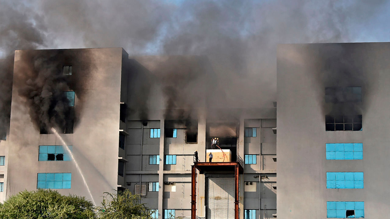 Firefighters try to control a fire that broke out at India's Serum Institute in Pune. Credit: AFP Photo