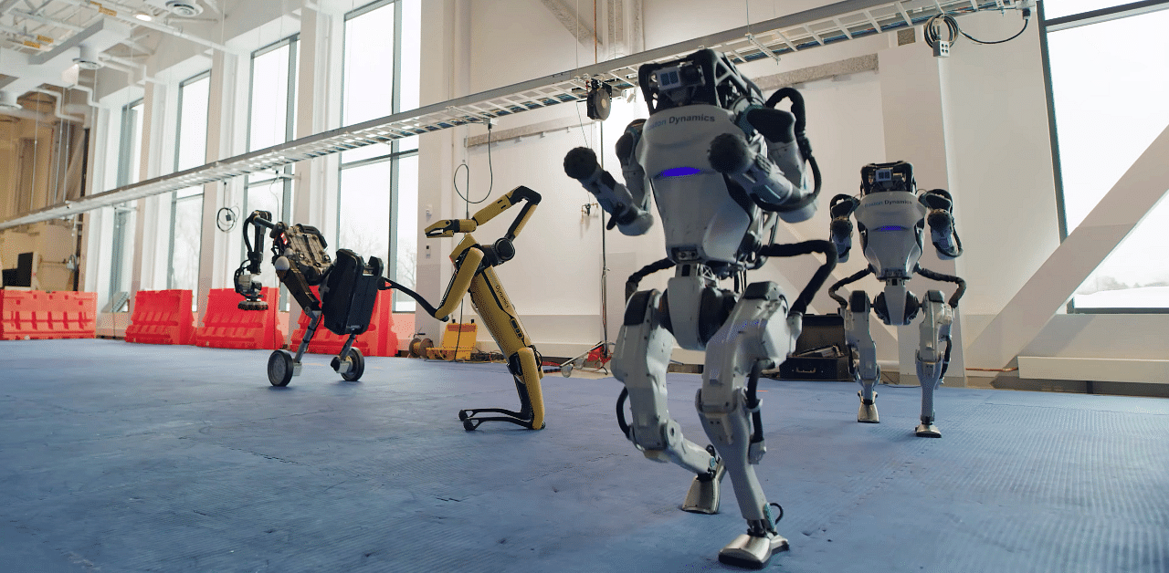 Spot, Handle and Atlas robots dance during a year-end video by the robotics company Boston Dynamics. Credit: Reuters Photo