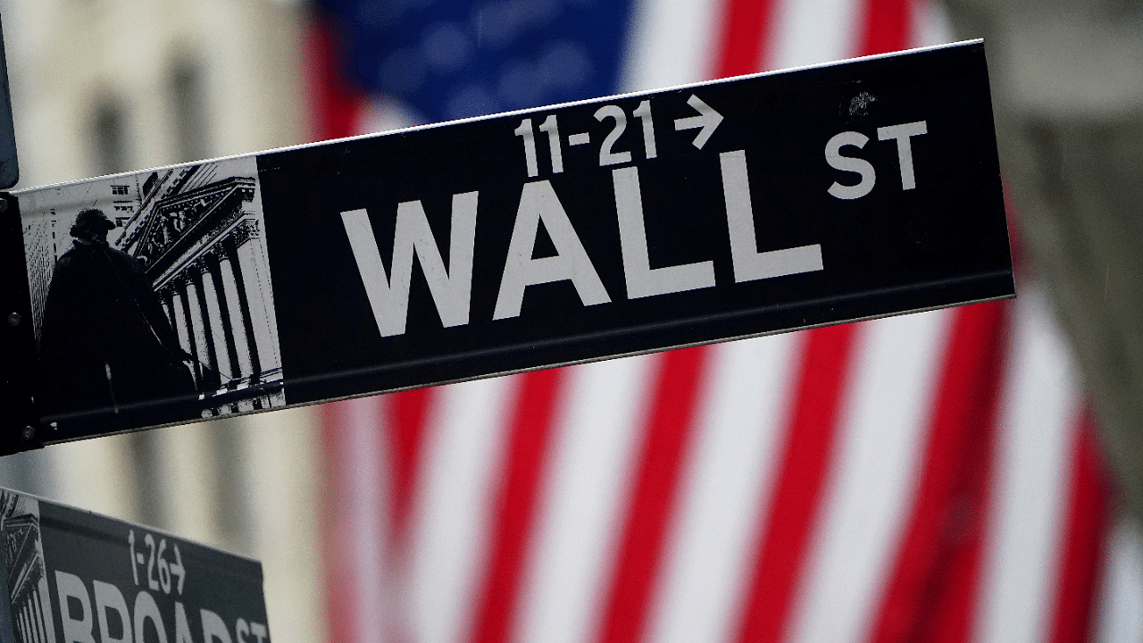 A Wall Street sign is pictured outside the New York Stock Exchange in the Manhattan borough of New York City, New York, US. Credit: Reuters File Photo